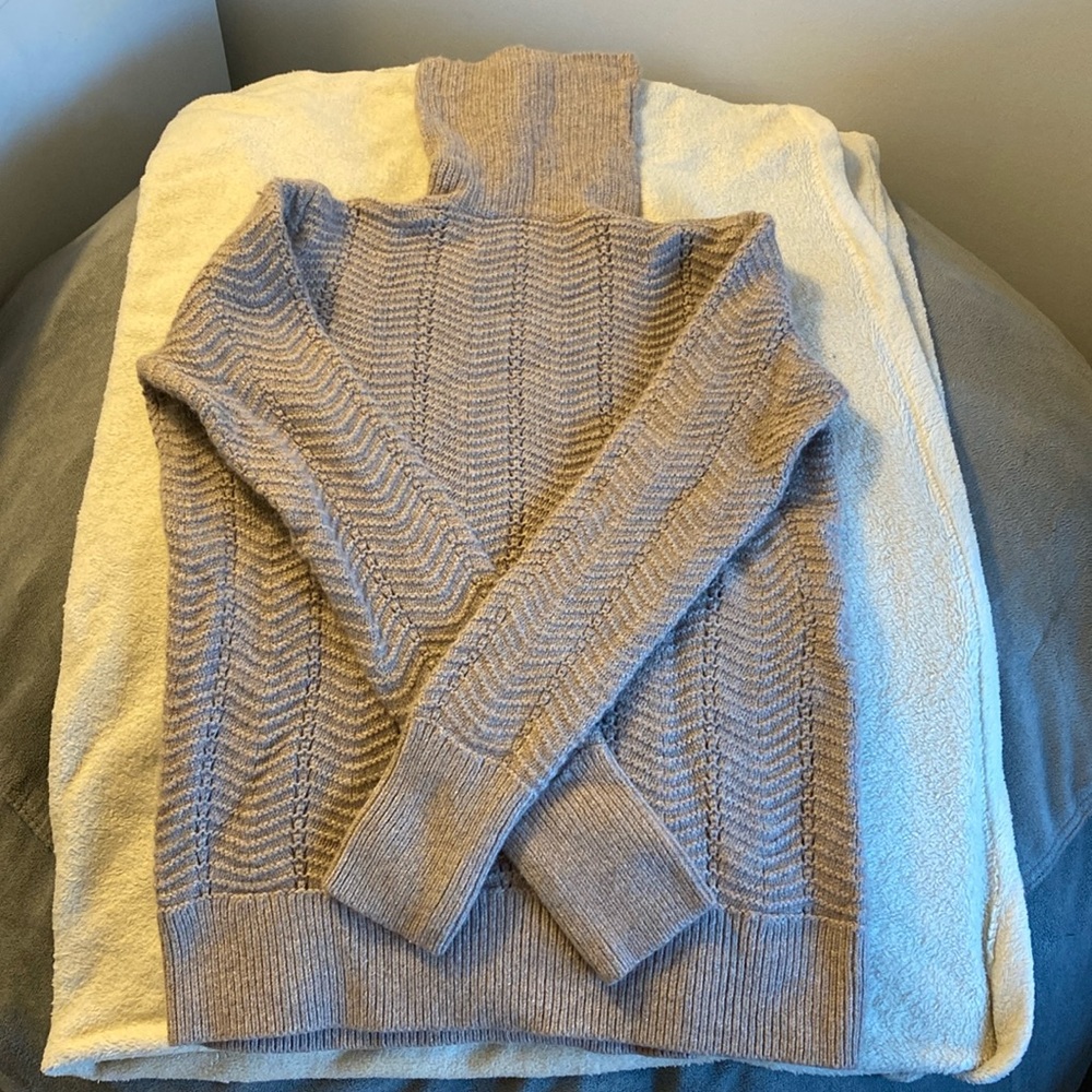 Medium tan knit turtle neck sweater
